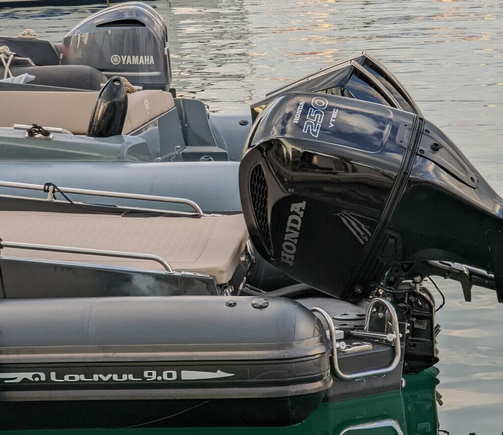 Black Honda 250 HP outboard on a luxurious rigid inflatable boat (RIB)