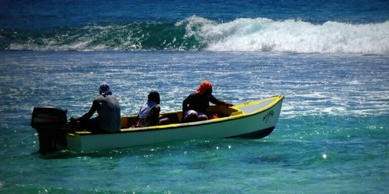 modern pirates in a small boat